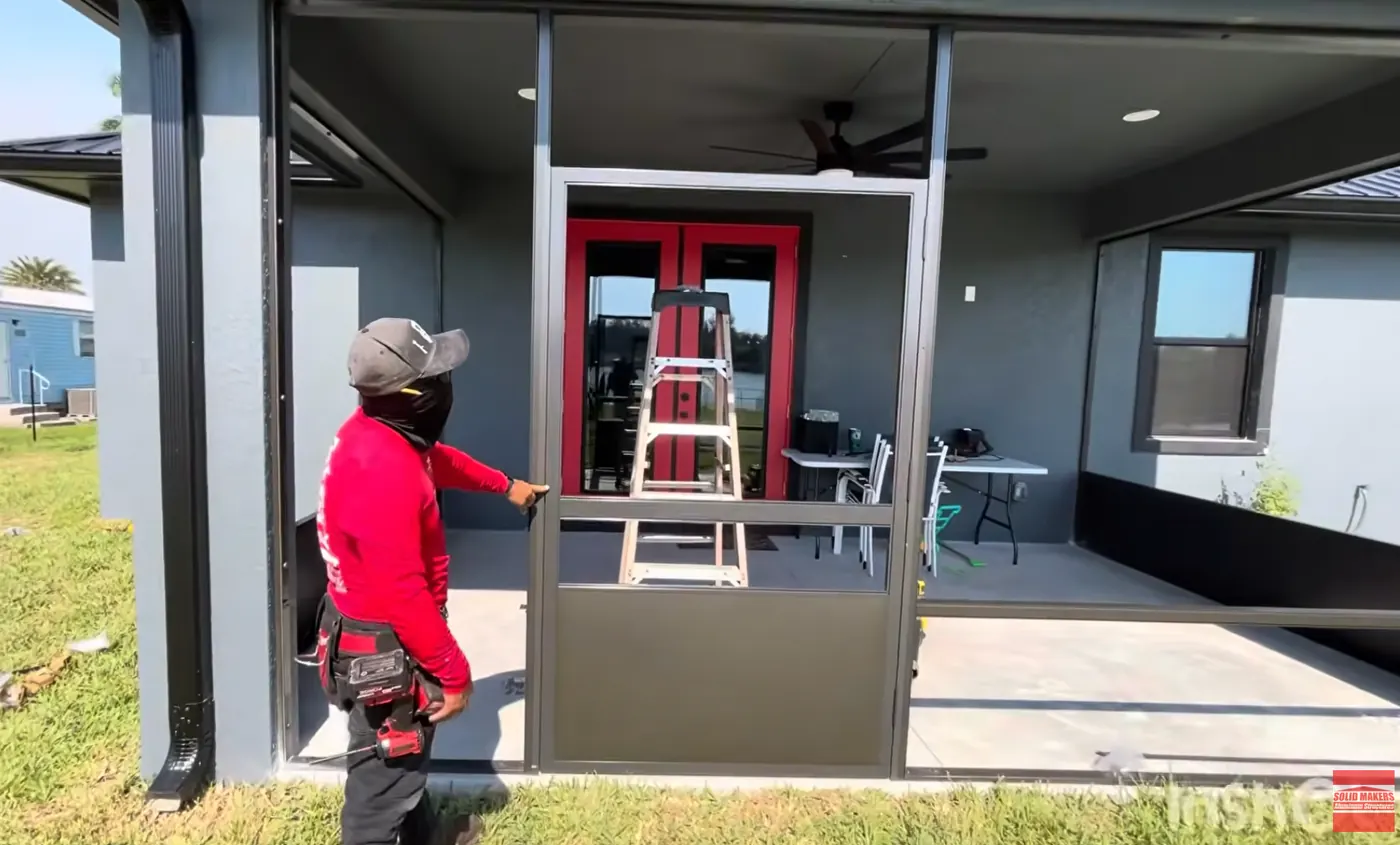 Door installed on the bronze screen enclosure in Clewiston, Florida