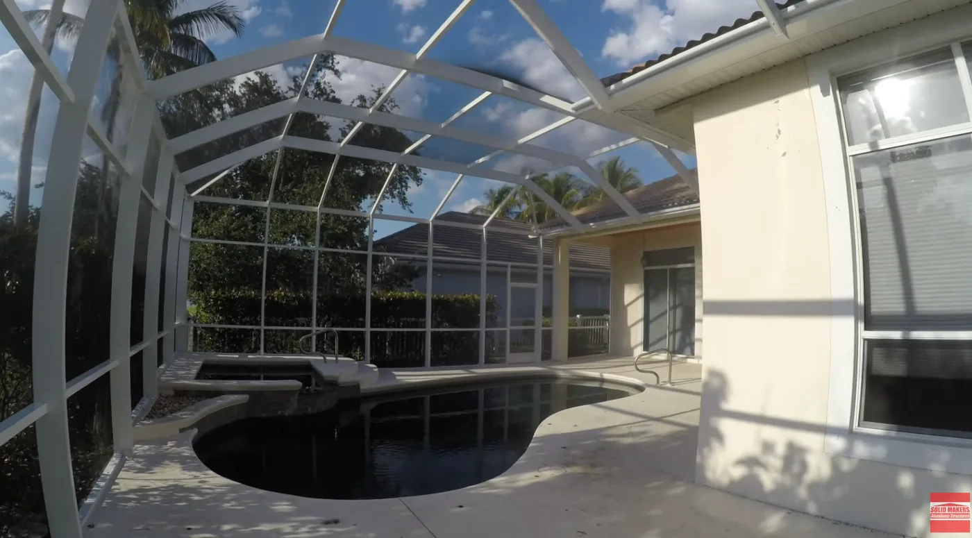 Finished pool screen enclosure built by Solid Makers in Fort Myers Florida