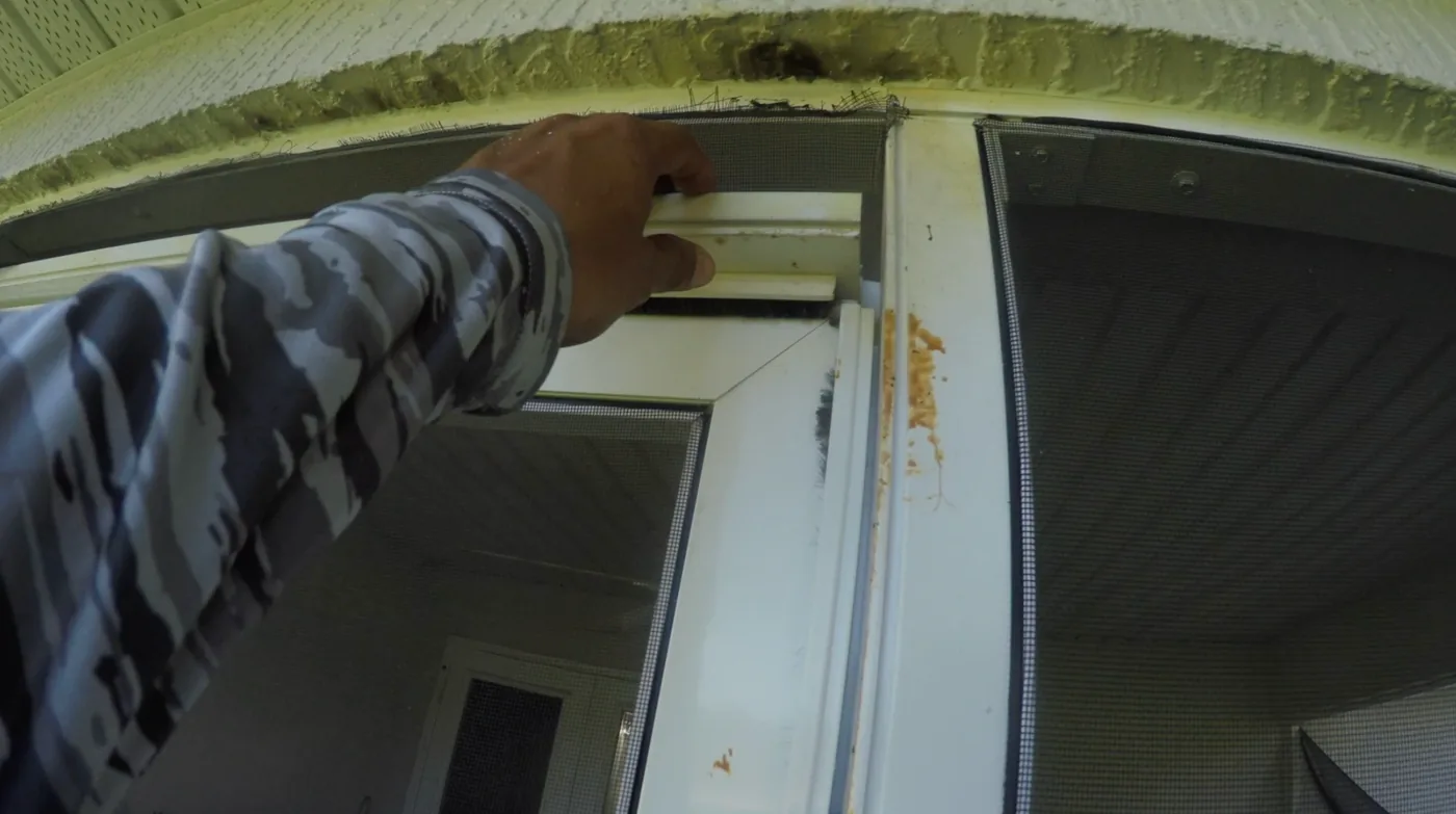 Poorly installed screen lanai framing and screen discovered during a repair in Port LaBelle Florida
