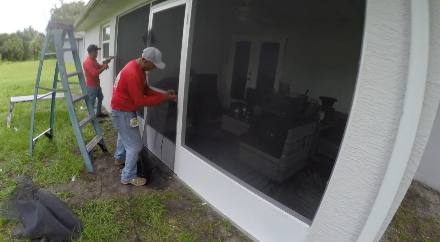 Rebuilt screen lanai in Port LaBelle Florida as Solid Makers finishes the new screen installation