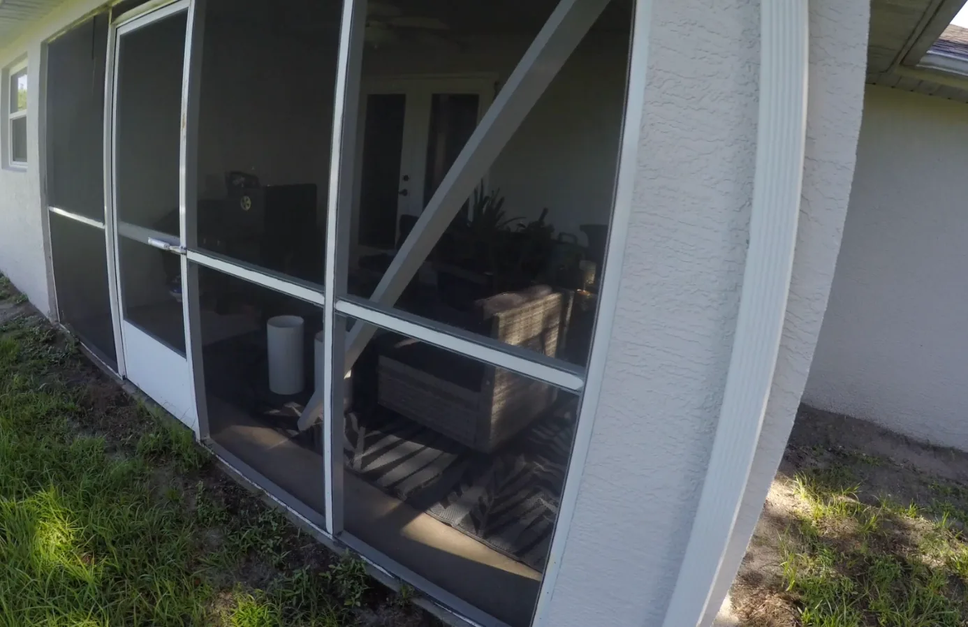 Screen lanai in Port LaBelle Florida before Solid Makers began the repair and rebuild