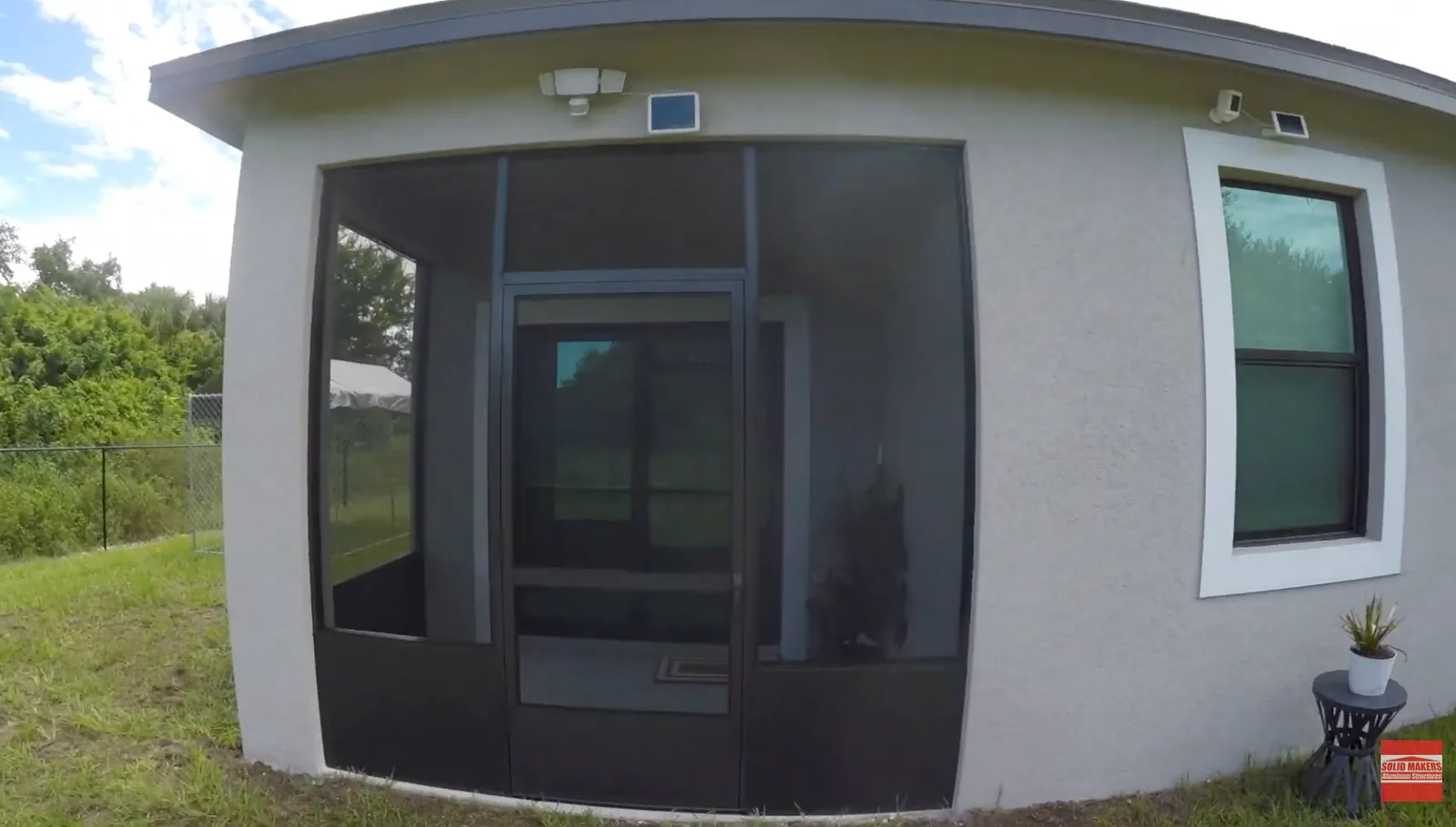 Finished bronze screen lanai enclosure in LaBelle Florida by Solid Makers Aluminum Structures