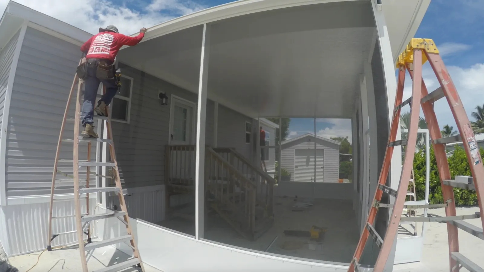 Aluminum wall framing and screen installation on Clewiston screen porch