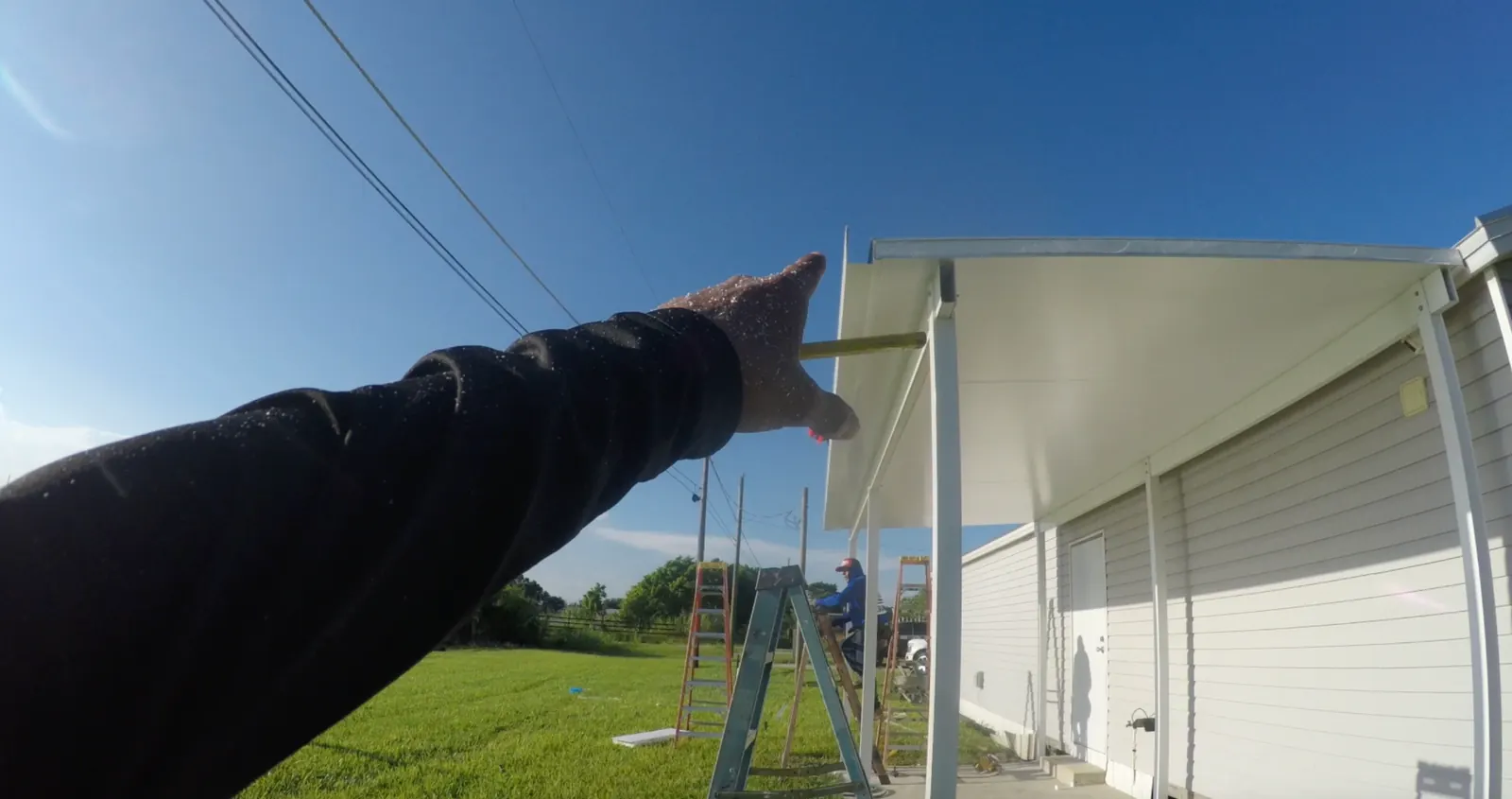 Extruded A gutter and fascia on insulated roof screen porch in Clewiston Florida